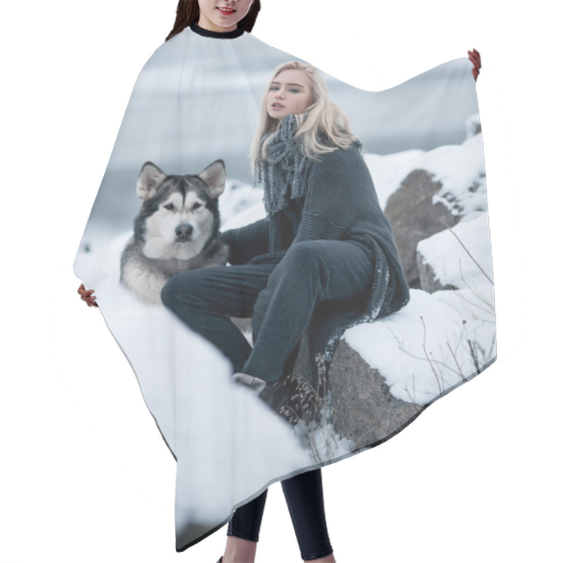 Personality  Girl With Dog Malamute Among Rocks In Winter.  Hair Cutting Cape