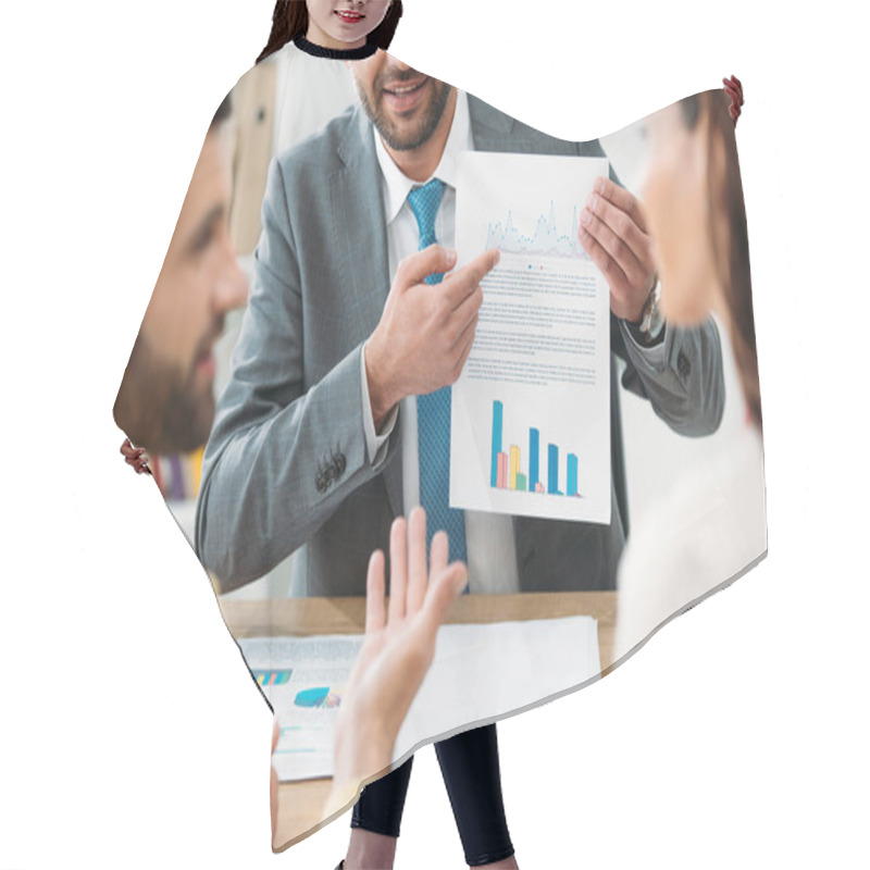 Personality  Cropped View Of Advisor Sitting At Table And Pointing With Finger At Documents To Investors In Office Hair Cutting Cape