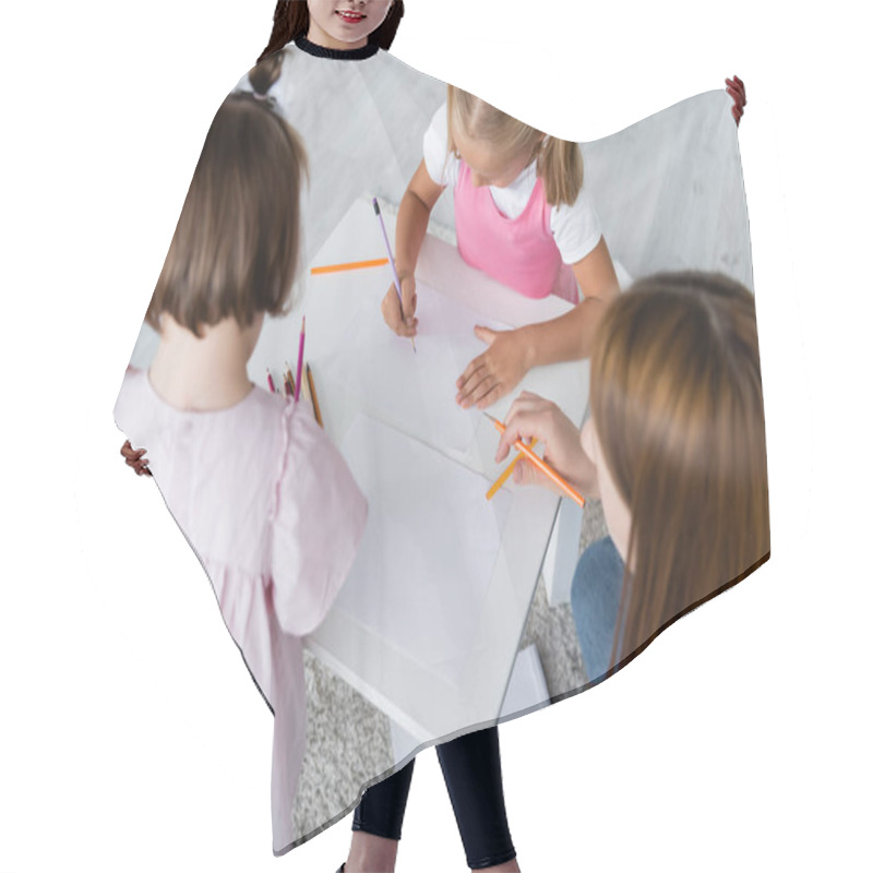 Personality  High Angle View Of Kids Drawing On Papers Near Kindergarten Teacher  Hair Cutting Cape