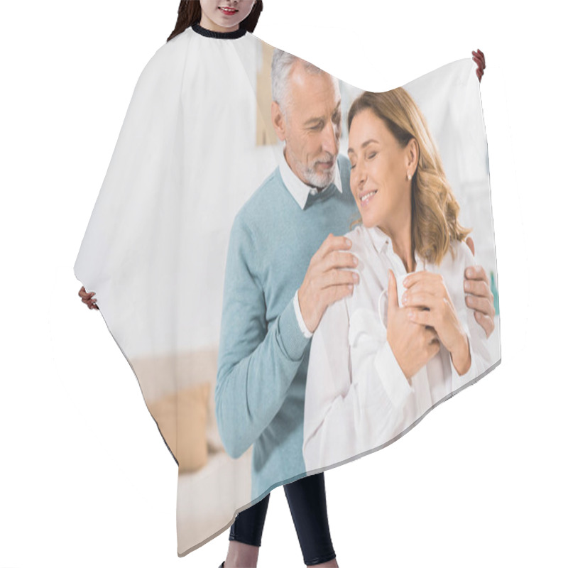 Personality  Handsome Mature Man Embracing Beautiful Wife With Coffee Cup At Home Hair Cutting Cape