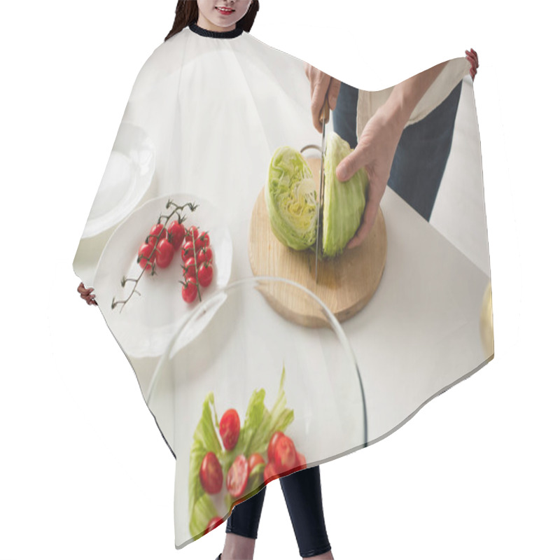 Personality  Top View Of Cropped Man Cutting Fresh Lettuce Near Ripe Cherry Tomatoes And Bowl With Salad Hair Cutting Cape