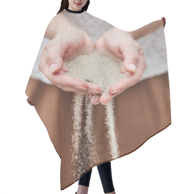 Personality  Girl Pouring Sand Out Of Her Hands. Hair Cutting Cape