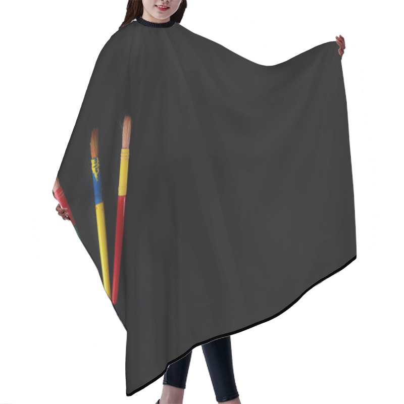 Personality  Three Vibrant Paintbrushes Stand Out Against A Dark Background, Symbolizing Creativity And Artistic Expression. Hair Cutting Cape