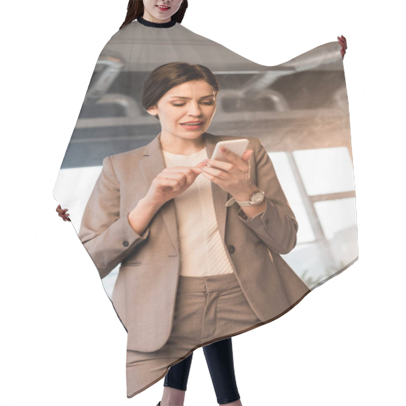 Personality  Scared Businesswoman Looking At Smartphone In Office With Smoke Hair Cutting Cape