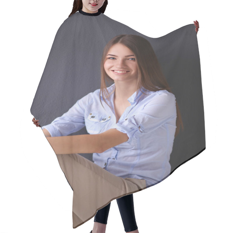 Personality  Young Woman Sitting On The Floor Near Dark Wall Hair Cutting Cape