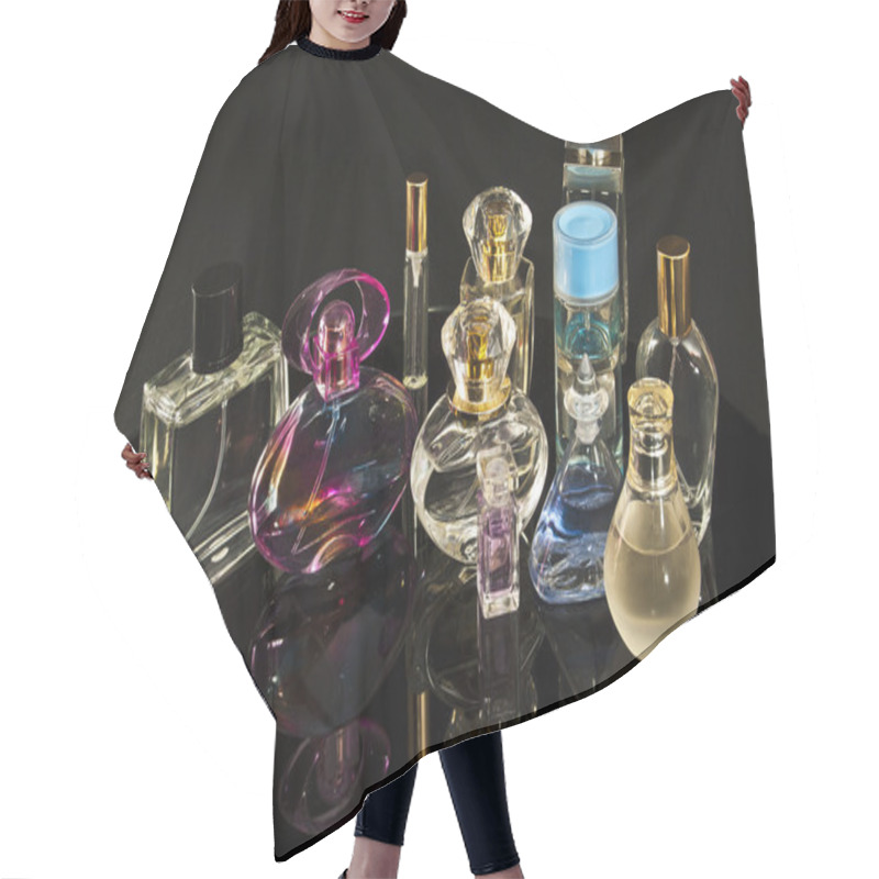 Personality  Perfume Still Life On A Dark Background. Hair Cutting Cape