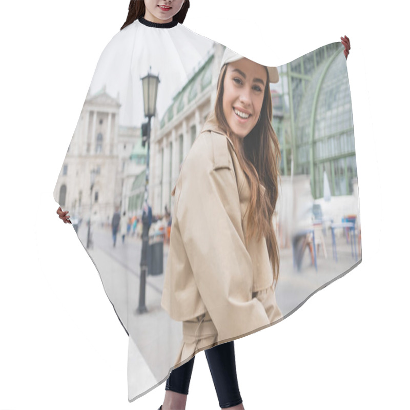 Personality  Happy Young Woman In Stylish Trench Coat And Baseball Cap  Hair Cutting Cape