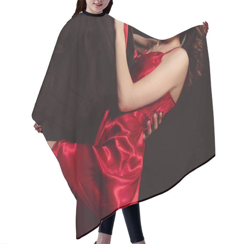 Personality  Cropped View Of Elegant Man Embracing And Holding By Led Seductive Woman In Red Dress Isolated On Black Hair Cutting Cape