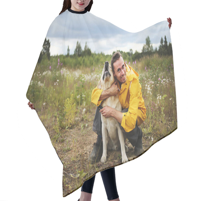 Personality  Side View Of Young Man Sitting And Hugging With Beige Labrador Retriever In Blooming Meadow With Cloudy Sky On Background Hair Cutting Cape