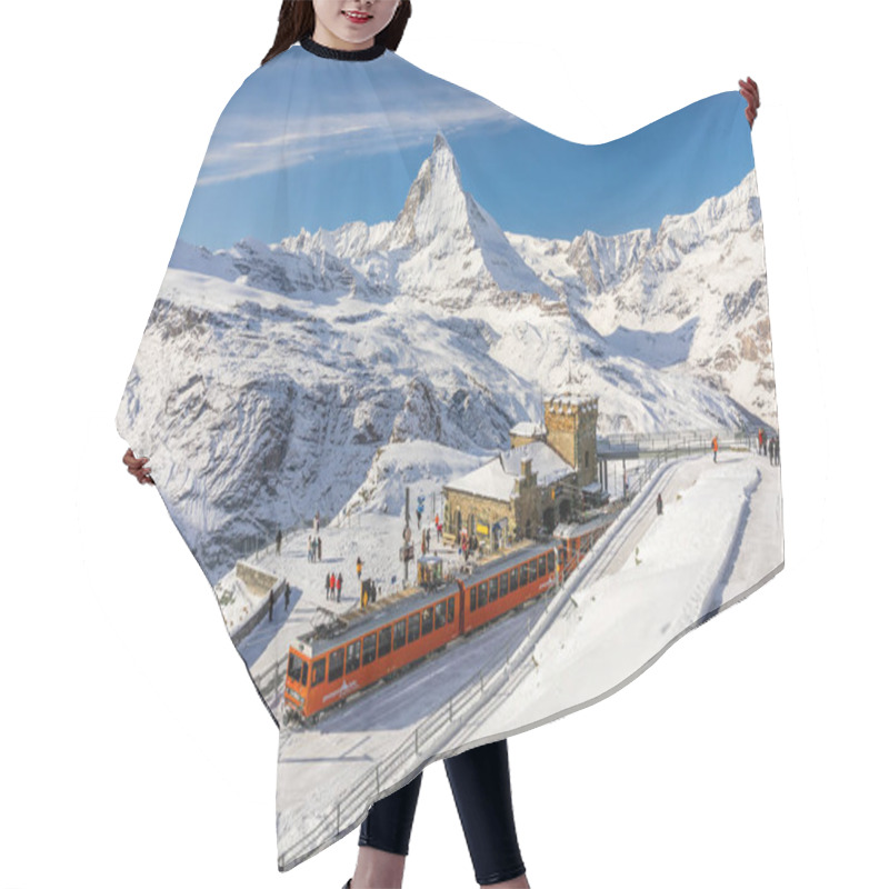 Personality  Gornergrat, Zermatt, Switzerland - November 12, 2019: Red Cable Car Train On Snowy Railway At Summit Station With Tourists And Matterhorn Summit In Winter Hair Cutting Cape