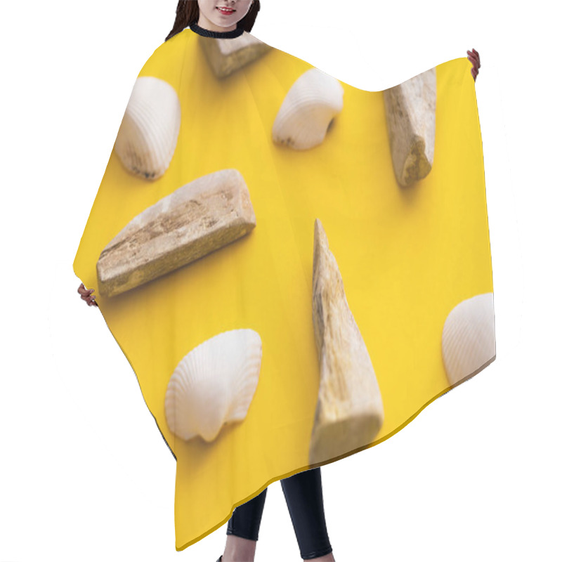 Personality  Top View Of White Seashells And Stones On Yellow Background  Hair Cutting Cape