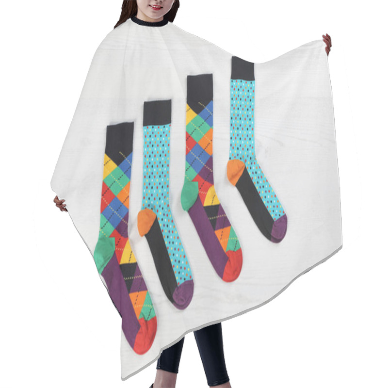 Personality  Flat Lay Composition With Different Socks  On Light Wooden Background Hair Cutting Cape