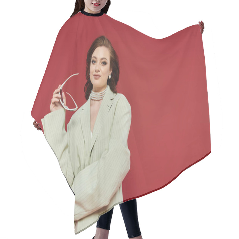 Personality  In Chic, Oversized Clothes, A Young Woman Confidently Showcases Her Fashion Flair. Hair Cutting Cape