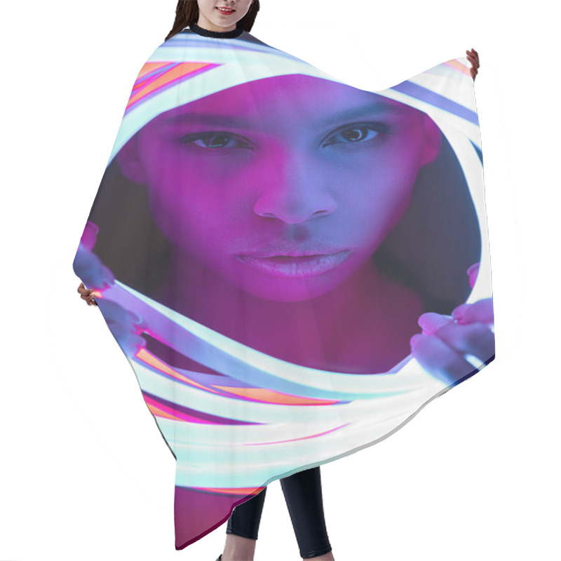 Personality  Portrait Of Futuristic African American Woman In Neon Lighting Hair Cutting Cape