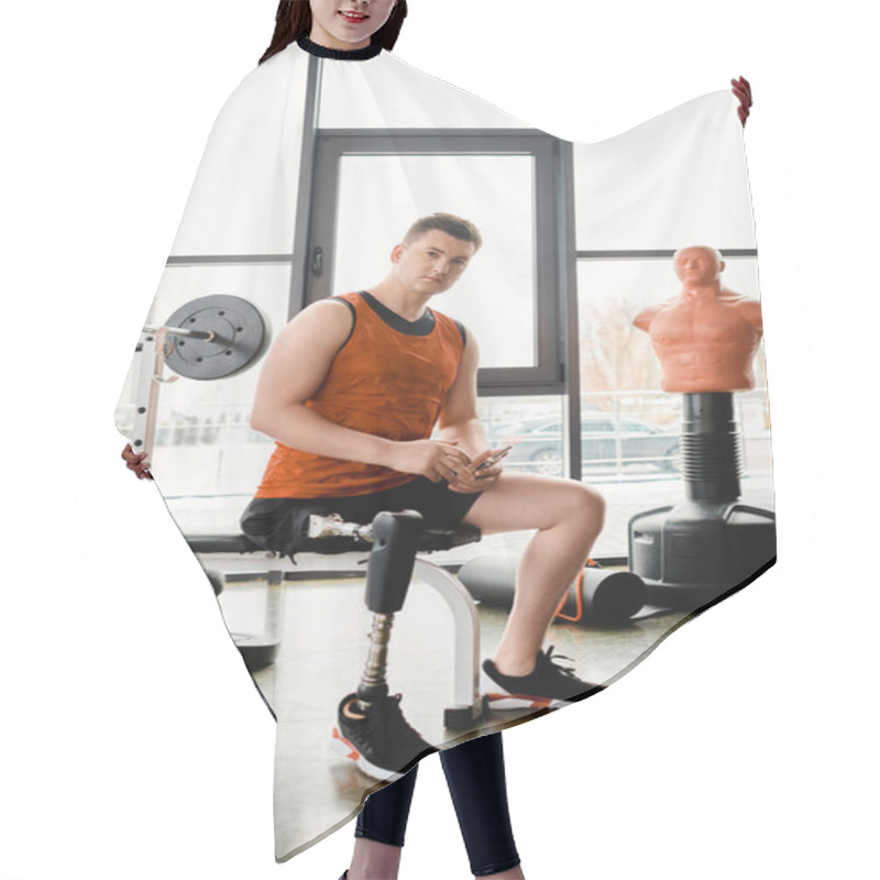 Personality  A Disabled Man With A Prosthetic Leg Sitting On A Gym Bench, Focused And Determined To Work Out. Hair Cutting Cape