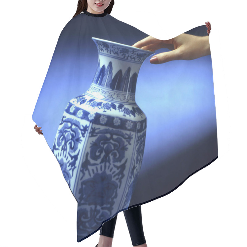 Personality  Hand Put A Decorated Ceramic Vase On A Table Hair Cutting Cape