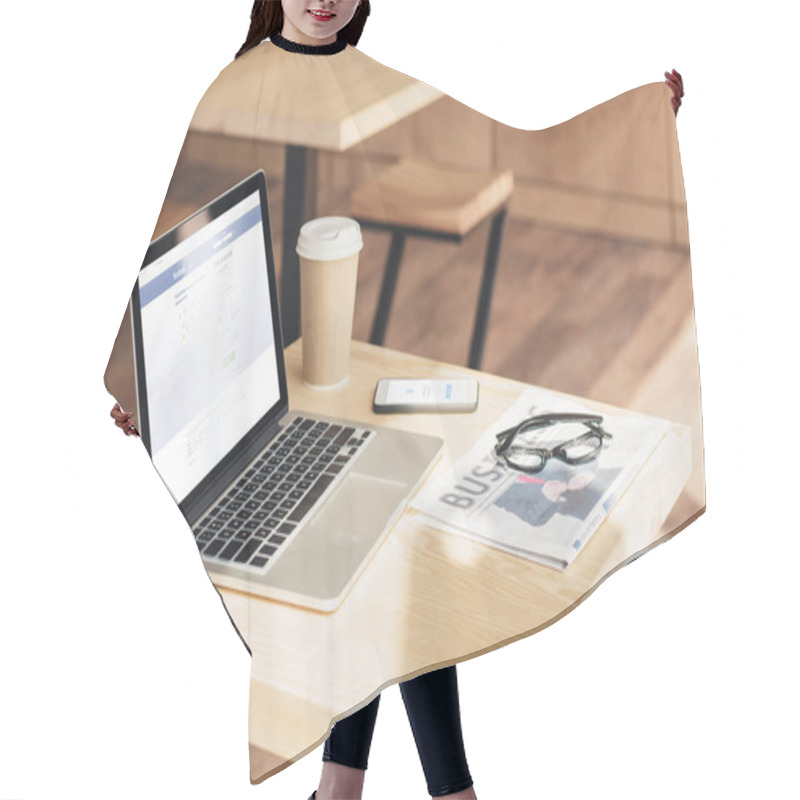 Personality  Laptop, Smartphone With Facebook Messenger And Business Newspaper On Table In Coffee Shop Hair Cutting Cape