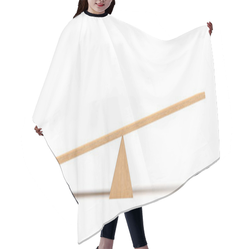 Personality  3d Rendering Of A Light Wooden Seesaw With The Left Side Leaning To The Ground On White Background. Hair Cutting Cape