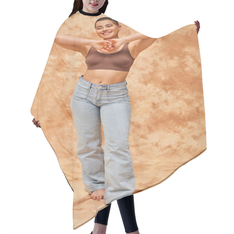 Personality  Body Positivity Movement, Jeans Look, Curvy And Joyful Woman In Crop Top Posing On Mottled Beige Background, Casual Attire, Self-acceptance, Generation Z, Tattooed, Smile, Full Length  Hair Cutting Cape