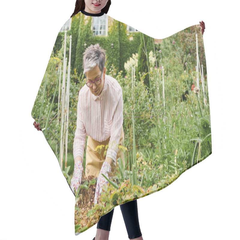 Personality  Good Looking Happy Mature Woman With Glasses Working In Her Vivid Green Garden And Smiling Joyfully Hair Cutting Cape