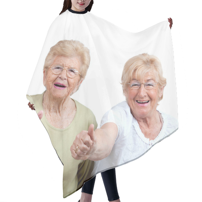 Personality  Two Elderly Woman Showing Thumbs Up. Hair Cutting Cape