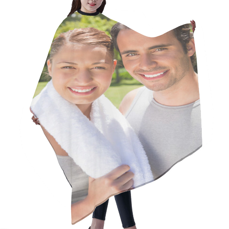 Personality  Woman Holding A Towel Smiling With A Man Hair Cutting Cape