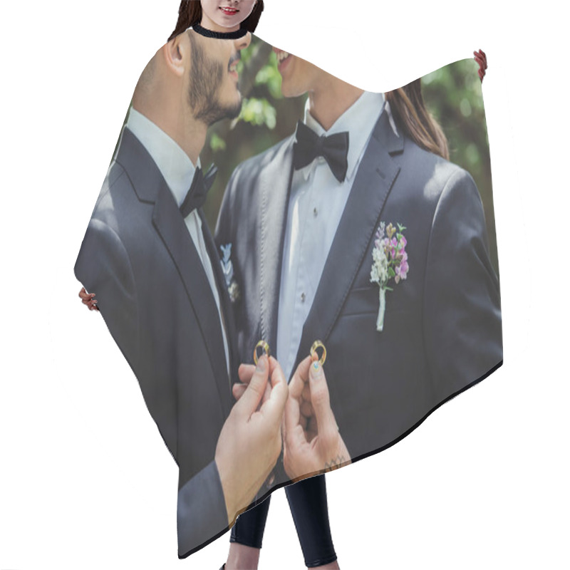 Personality  Cropped View Of Happy Gay Couple Holding Wedding Rings In Hands  Hair Cutting Cape