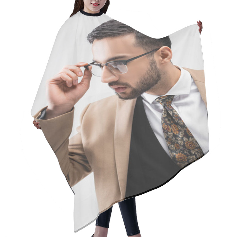 Personality  Young, Stylish Muslim Man Adjusting Eyeglasses Isolated On Grey Hair Cutting Cape