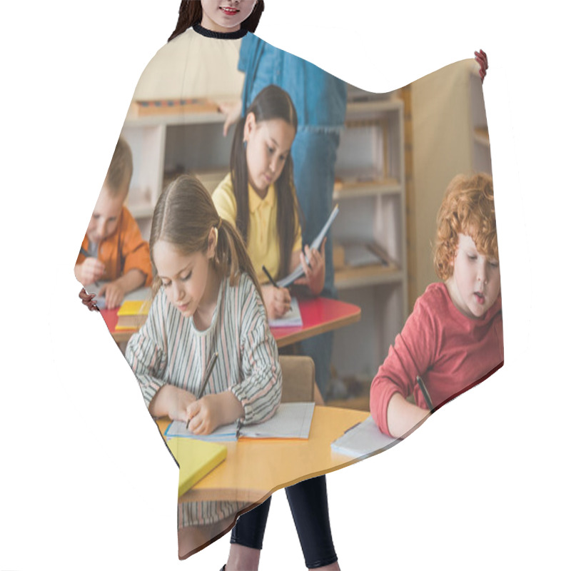 Personality  Multiethnic Children Writing In Notebooks Near Teacher On Blurred Background Hair Cutting Cape