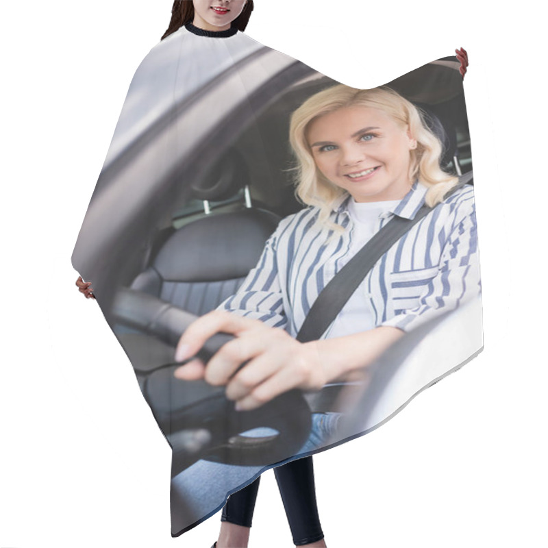 Personality  Positive Blonde Woman Looking At Camera In Auto During Driving Courses  Hair Cutting Cape