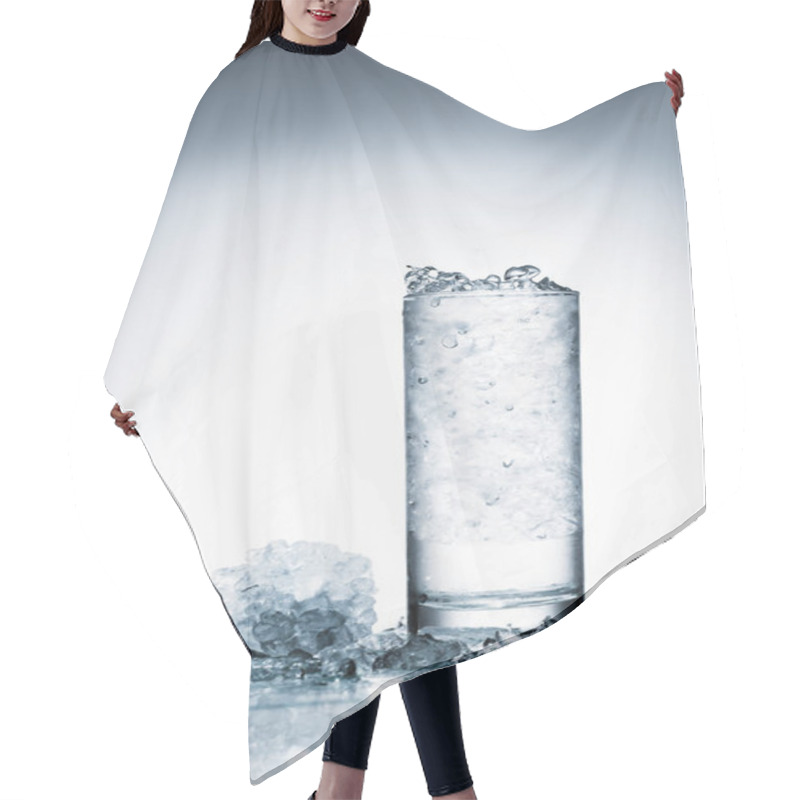 Personality  Glass Of Cold Water With Ice On Reflective Surface On White  Hair Cutting Cape