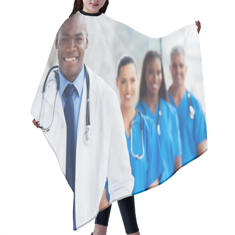 Personality  Young African American Doctor And Colleagues Hair Cutting Cape