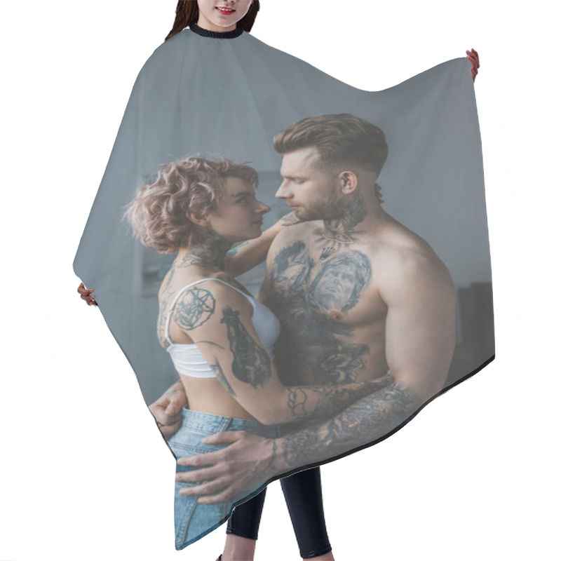 Personality  Young Tattooed Couple Embracing In Bedroom Hair Cutting Cape