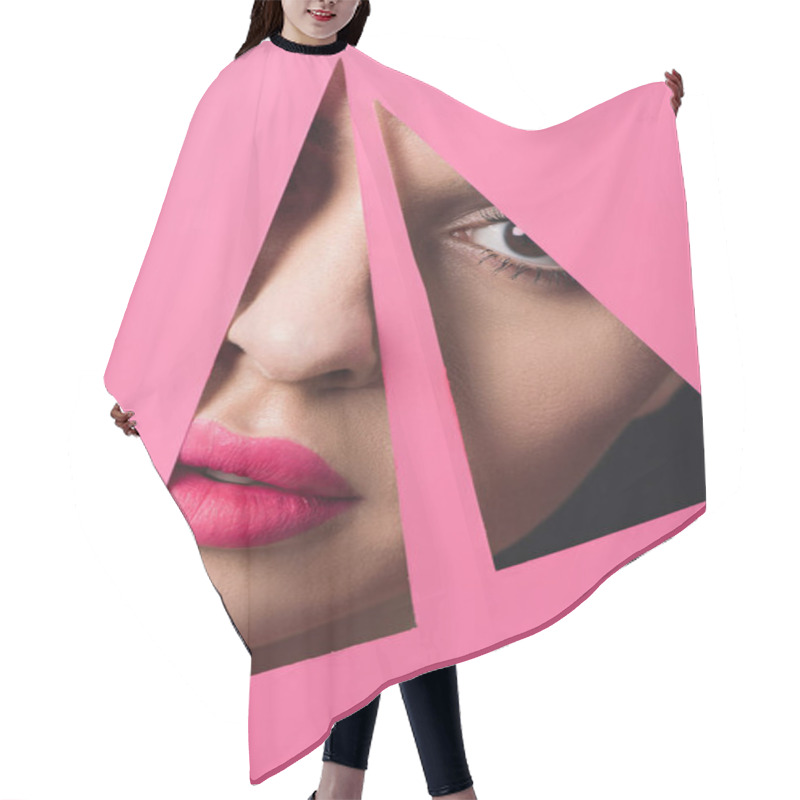 Personality  Girl With Pink Lips Looking At Camera Across Triangular Holes In Paper On Black Background Hair Cutting Cape