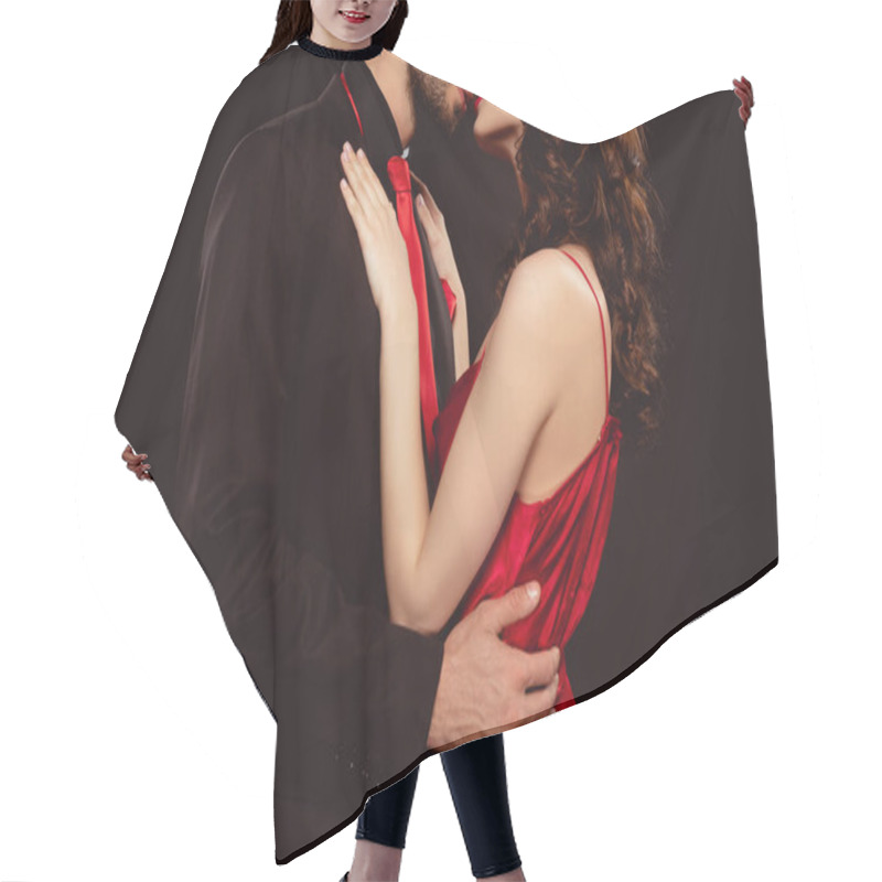 Personality  Cropped View Of Elegant Man In Formal Wear Kissing And Hugging Girlfriend In Red Dress Isolated On Black Hair Cutting Cape