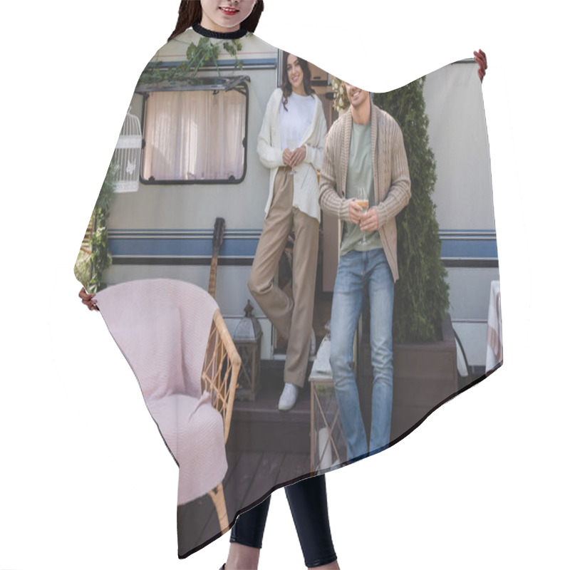 Personality  Smiling Couple In Cardigans Holding Glasses Of Wine Near Camper Van  Hair Cutting Cape