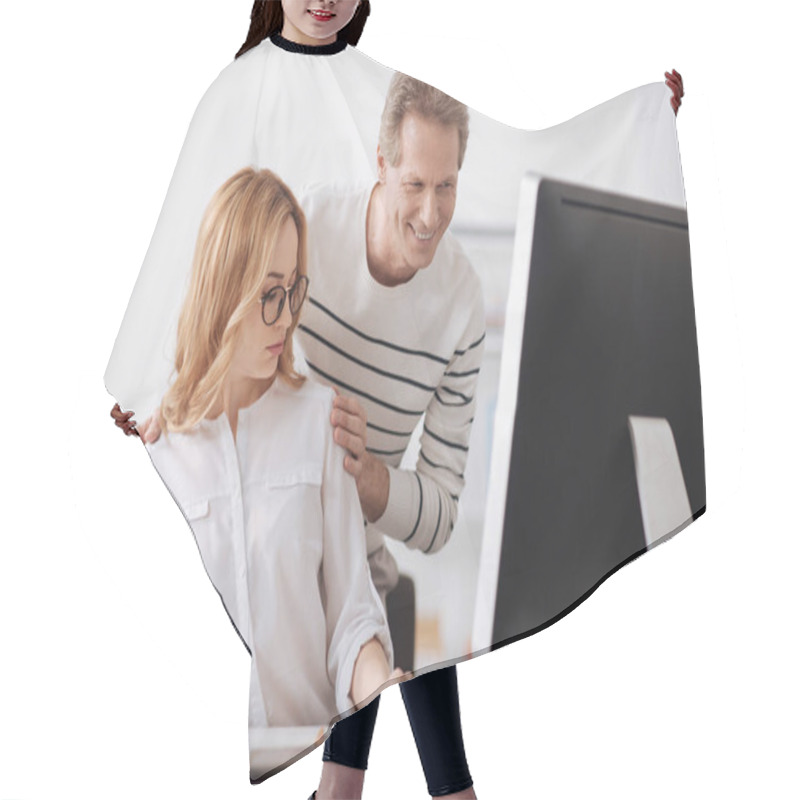 Personality  Young Office Manager Collaborating With Senior Colleague At Work Hair Cutting Cape