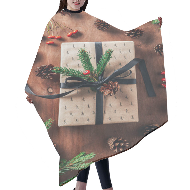 Personality  Top View Of Christmas Gift With Fir Tree Branches, Pine Cones And Decorative Berries On Wooden Background Hair Cutting Cape