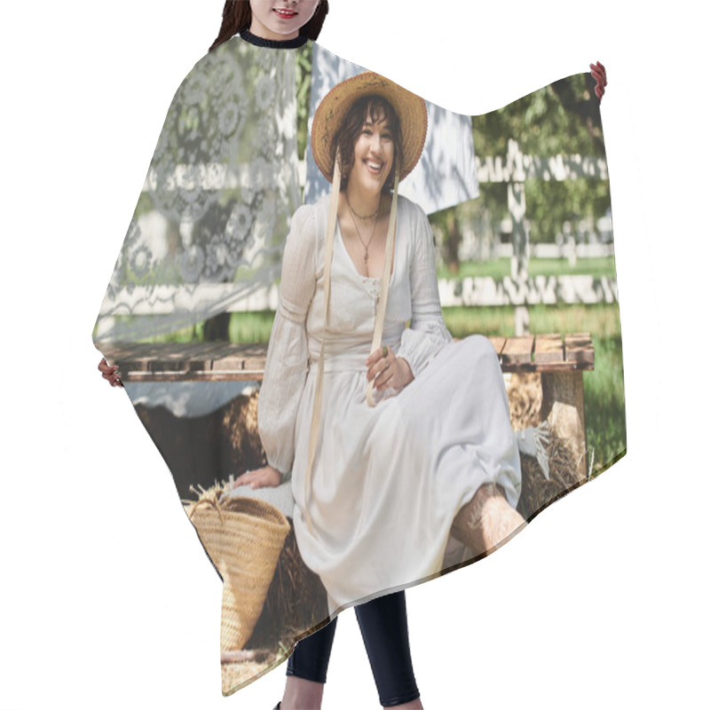 Personality  A Woman In A White Dress And Straw Hat Smiles Brightly In A Summer Garden Setting. Hair Cutting Cape