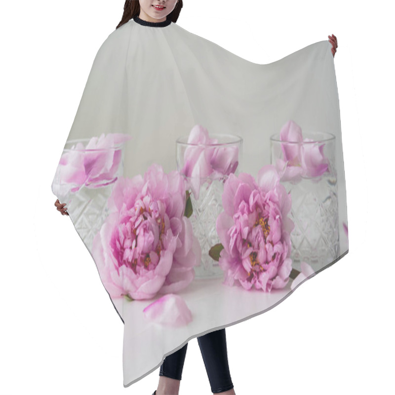 Personality  Floral Petals And Pink Peonies Near Glasses With Tonic On White Surface Isolated On Grey Hair Cutting Cape