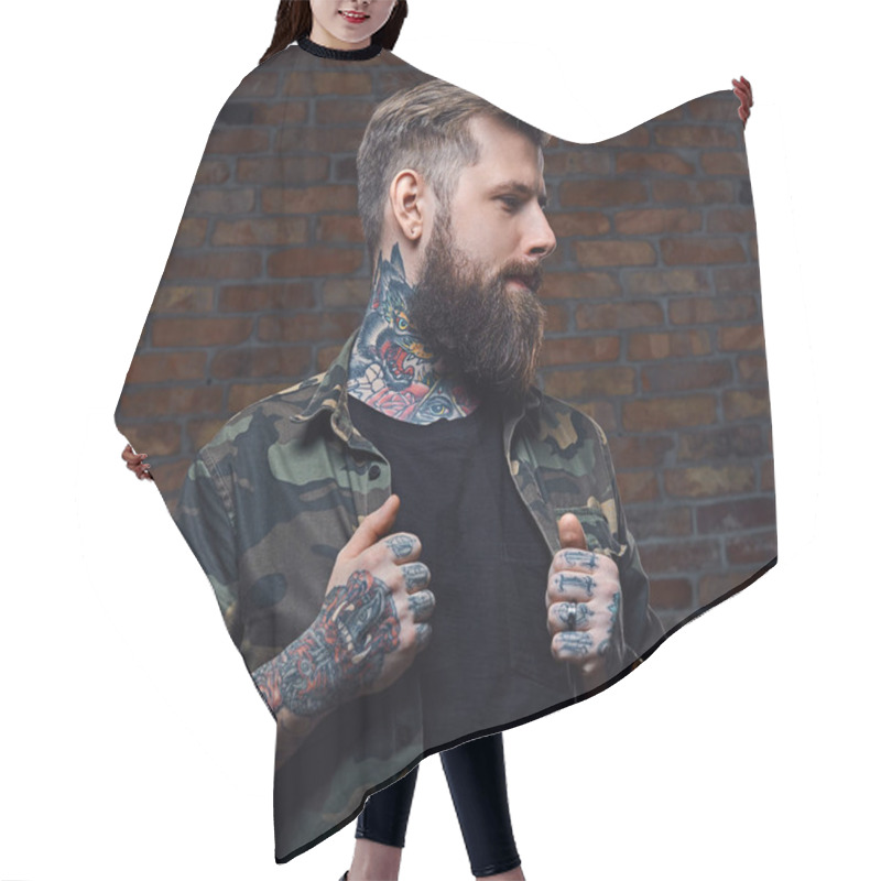 Personality  Tattooed Bearded Male In Military Jacket. Hair Cutting Cape