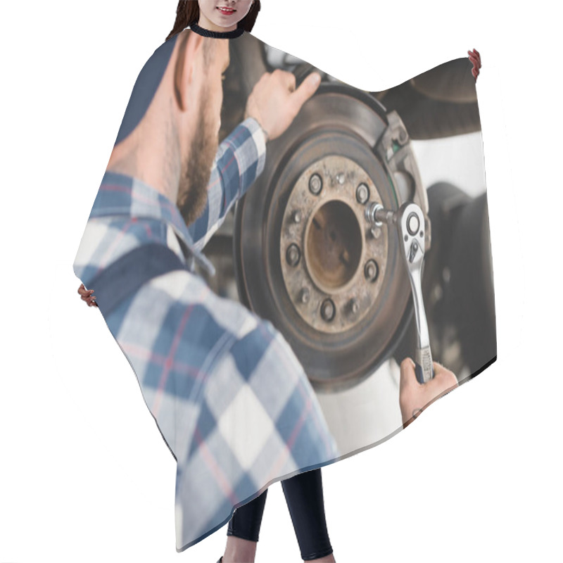 Personality  Back View Of Repairman Fixing Wheel Hub With Wrench On Blurred Foreground Hair Cutting Cape