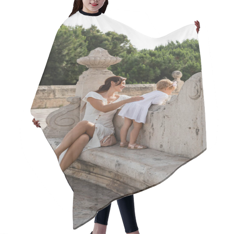 Personality  Smiling Woman Touching Daughter On Stone Bench Of Puente Del Mar Bridge In Valencia Hair Cutting Cape