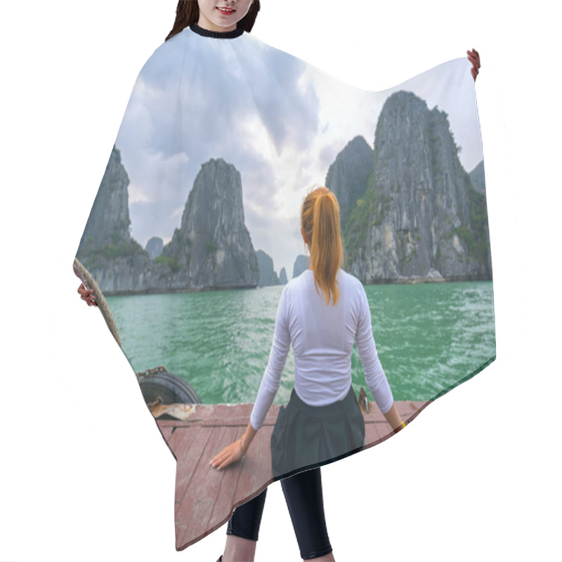 Personality  Back View Woman Traveler Sitting On Boat Looking Relaxed Among The Islands At Halong Bay, Vietnam. Hair Cutting Cape