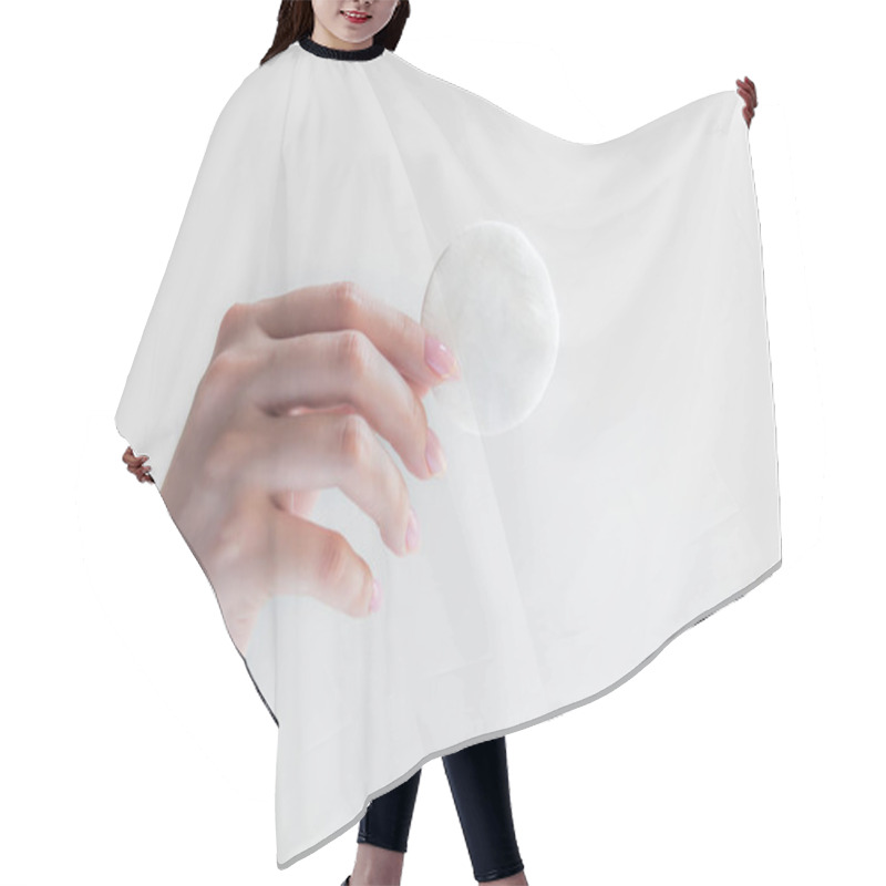 Personality  Woman Holding Cotton Pad On White Background, Closeup, Wadded Disks In A Female Hand On A White Background Isolation Hair Cutting Cape