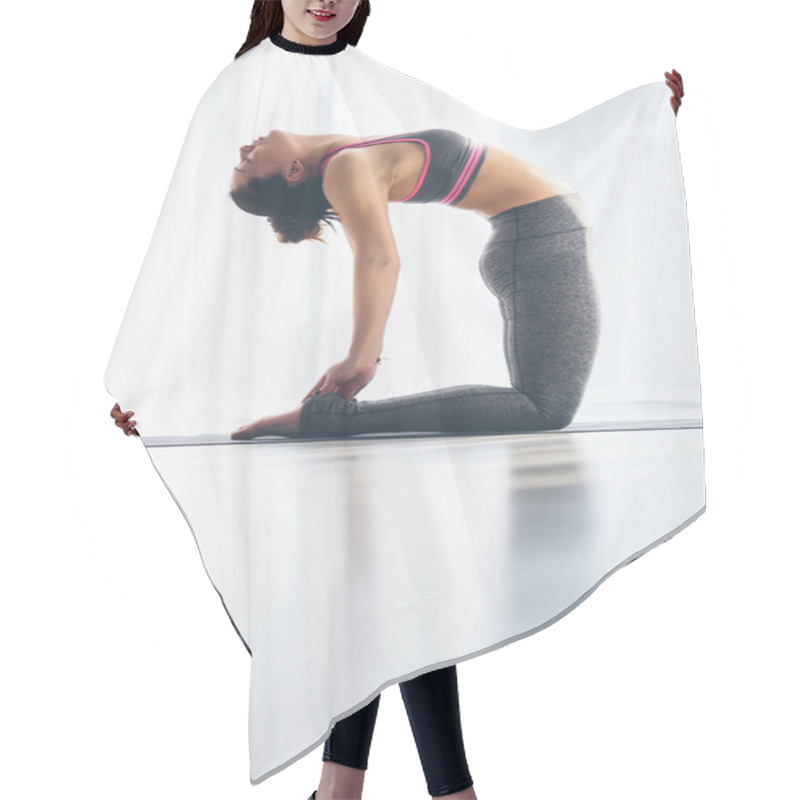 Personality  Beautiful Yoga Woman Practice In A Training Hall Background. Yoga Concept. Hair Cutting Cape