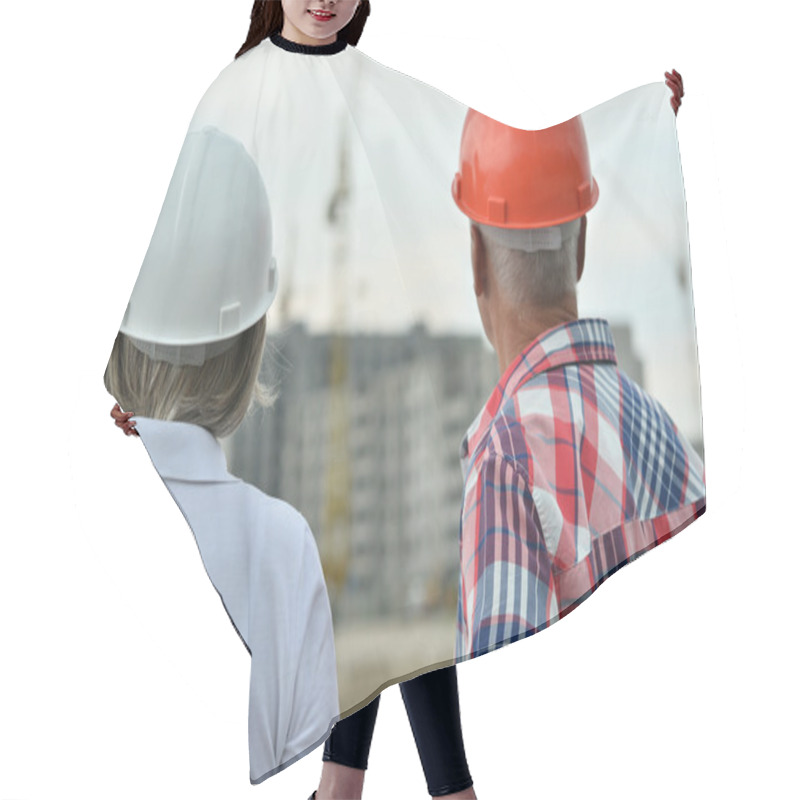 Personality  Senior Couple In Under Construction Hair Cutting Cape