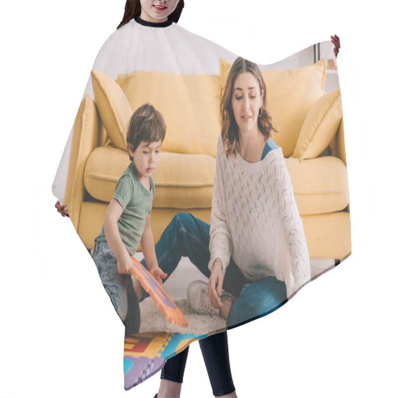 Personality  Mother And Son Playing With Alphabet Puzzle Mat On Carpet Hair Cutting Cape