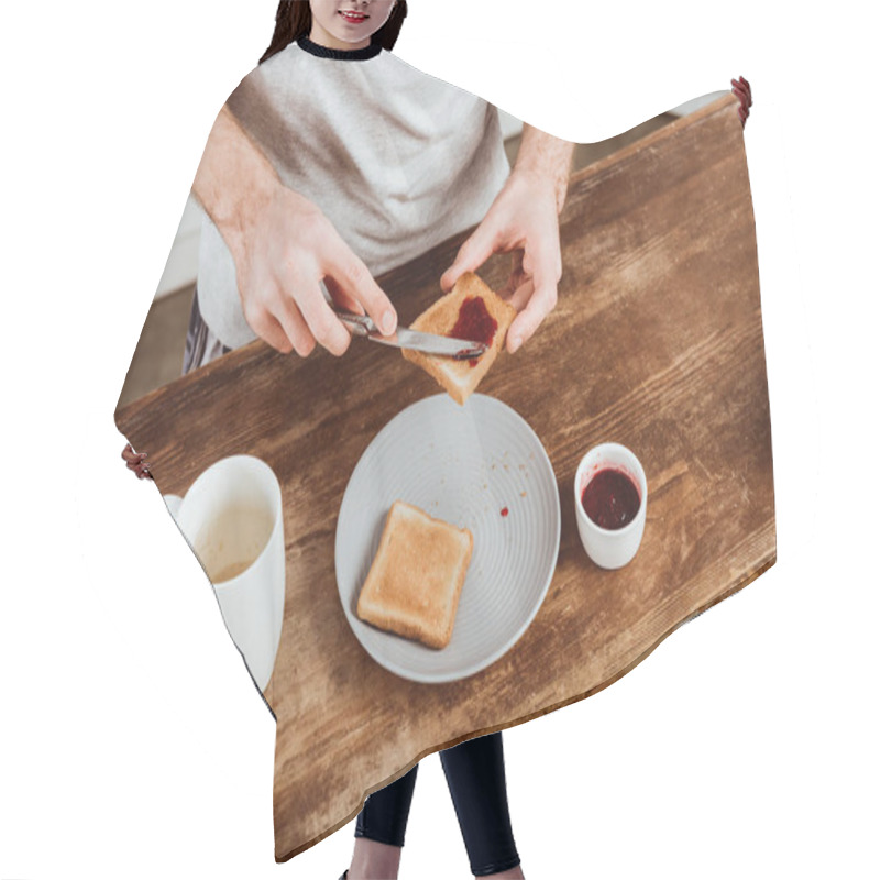 Personality  Partial View Of Man Spreading Toast By Jam At Table With Coffee Cup In Kitchen At Home Hair Cutting Cape