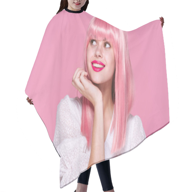 Personality  Studio Shot. Young Girl In Pink Wig Looking Away On Pink Background Hair Cutting Cape